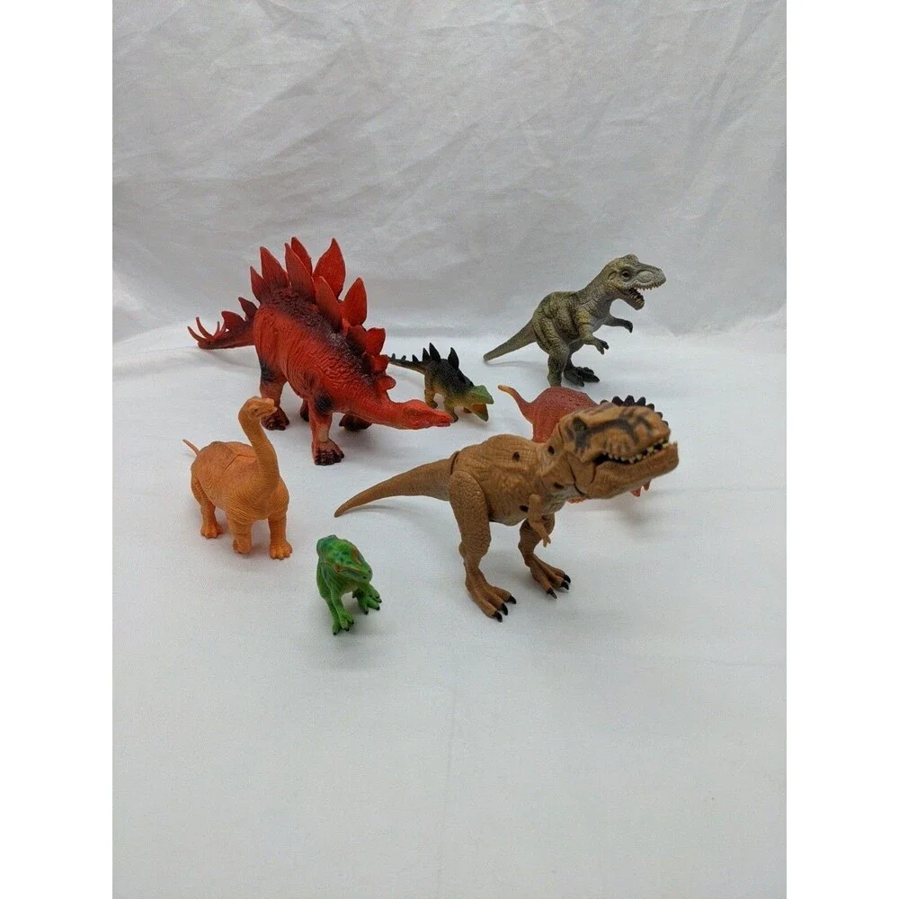 Lot Of (7) Dinosaur Toys Trex Stegasaurs Triceratops